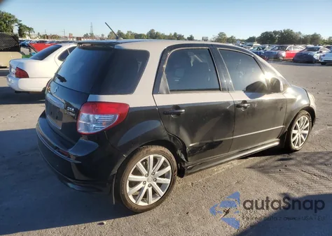 2012 Suzuki Sx4 из США, поврежденный, VIN JS2YA5A57C6300245